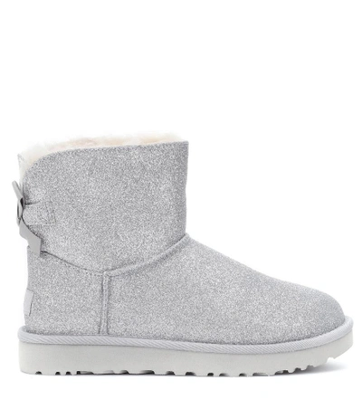 Shop Ugg Mini Bailey Bow Glitter Ankle Boots In Silver