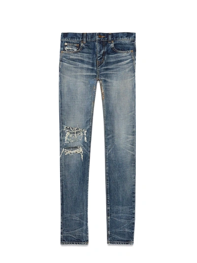 Shop Saint Laurent Low-rise Skinny Jeans In Faded Blue Destroy Denim In Dark Old Used Blue