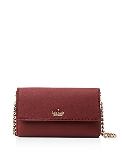 Shop Kate Spade New York Cameron Street Delilah Small Leather Crossbody In Sienna Red