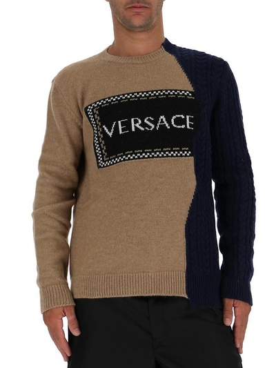Shop Versace Asymmetric Knitted Logo Sweater In Brown