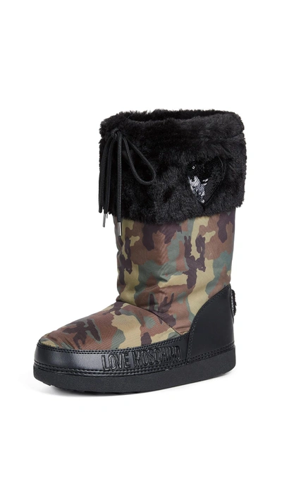 Shop Moschino Snow Boots In Camo
