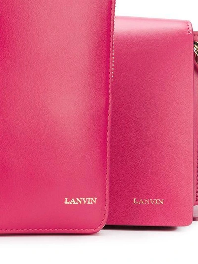 Shop Lanvin Logo Embossed Crossbody Bag In Pink