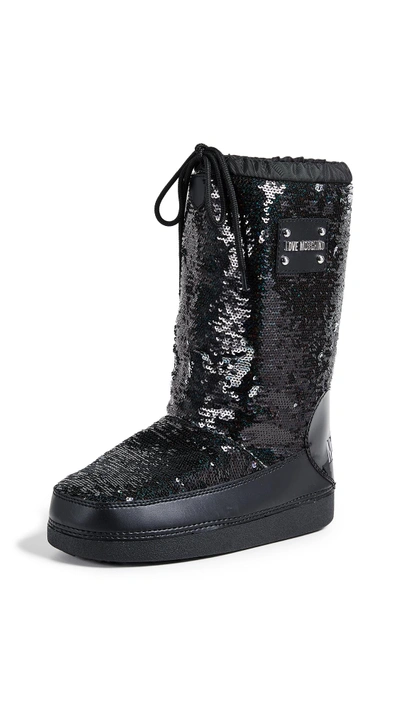 Shop Moschino Love  Sequin Snow Boots In Black