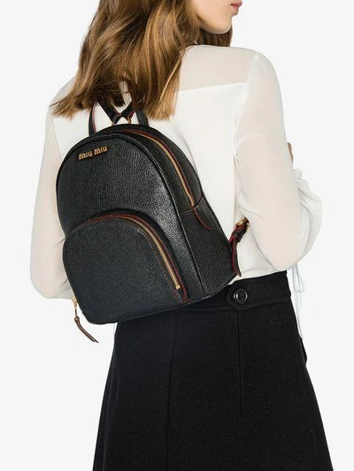 Shop Miu Miu Madras Mini Backpack - Black