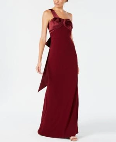 Shop Adrianna Papell Bow-embellished One-shoulder Gown In Garnet