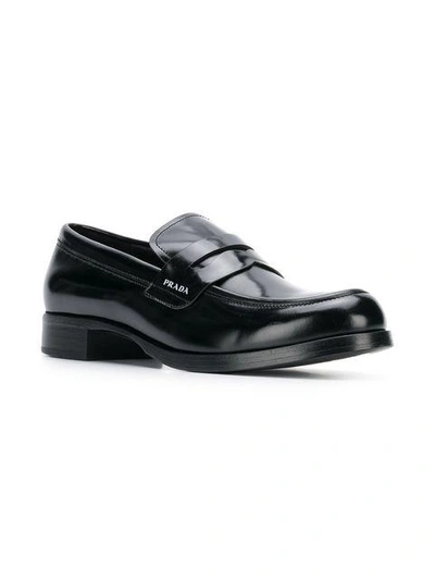 Shop Prada Brushed Leather Loafers In Black