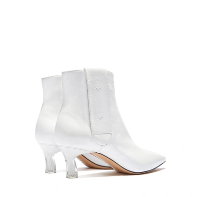 Shop Casadei Plexi Blade In White