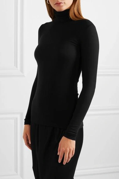 Shop Atm Anthony Thomas Melillo Ribbed Stretch-micro Modal Turtleneck Top In Black