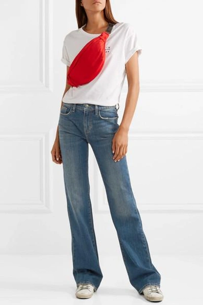 Shop Current Elliott The Jarvis Distressed High-rise Flared Jeans In Mid Denim