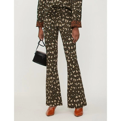 Shop Diane Von Furstenberg Leopard-print Flared Woven Trousers In Olive Black Heyford