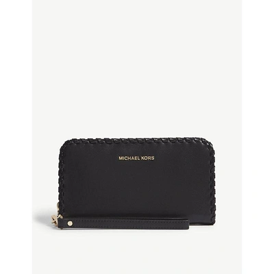 Shop Michael Michael Kors Whipstitch Leather Wristlet Wallet In Black