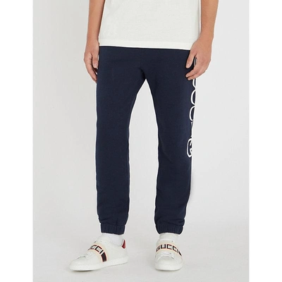 Shop Gucci Ny Logo Cotton-jersey Jogging Bottoms In Navy