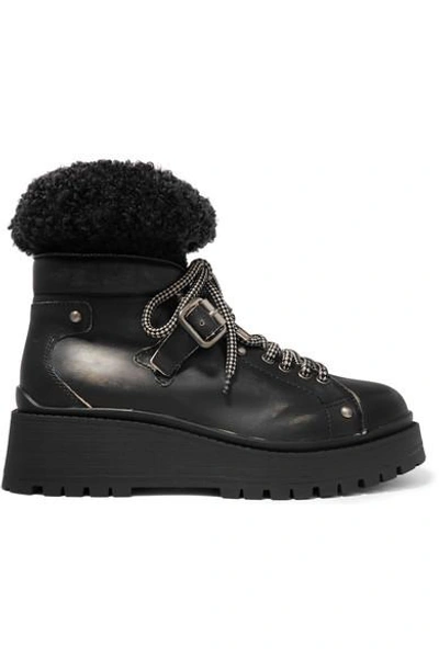 Shop Miu Miu Shearling-trimmed Leather Ankle Boots In Black