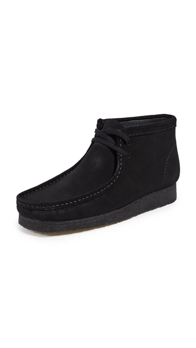 Shop Clarks Suede Wallabee Boots Black