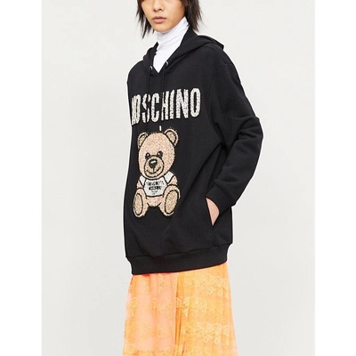 Shop Moschino Teddy Crystal-embellished Cotton-jersey Hoody In Black
