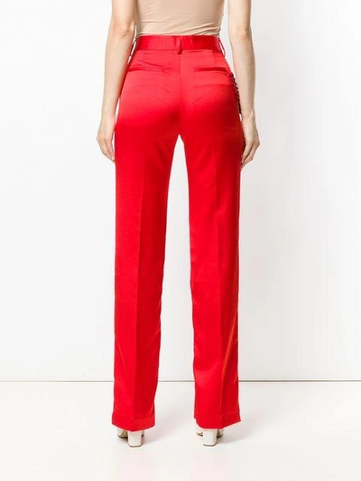 Shop Msgm Chain Trousers In Red