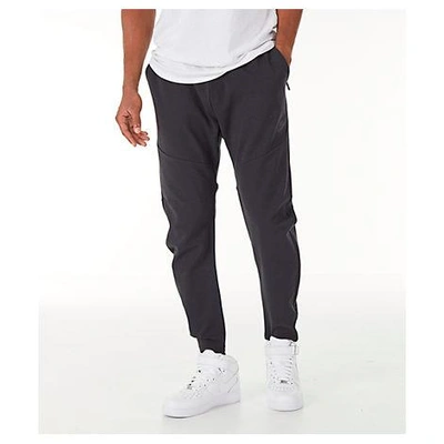 Shop Nike Men's Sportswear Tech Woven Jogger Pants, Black