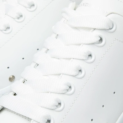Shop Alexander Mcqueen Wedge Sole Stud Front Sneaker In White