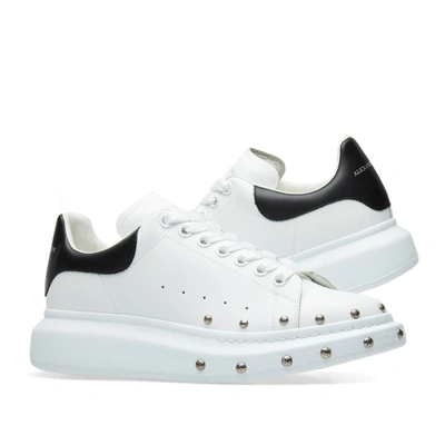 Shop Alexander Mcqueen Wedge Sole Stud Front Sneaker In White