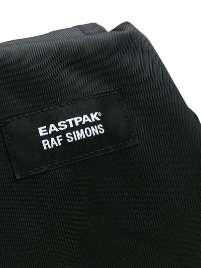 Shop Eastpak X Raf Simons Crossbody Backpack - Black