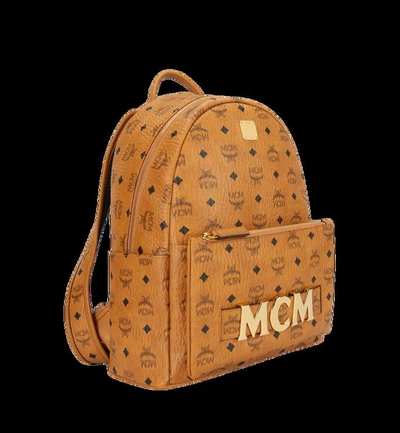 Shop Mcm Trilogie Stark Backpack In Visetos In Cognac