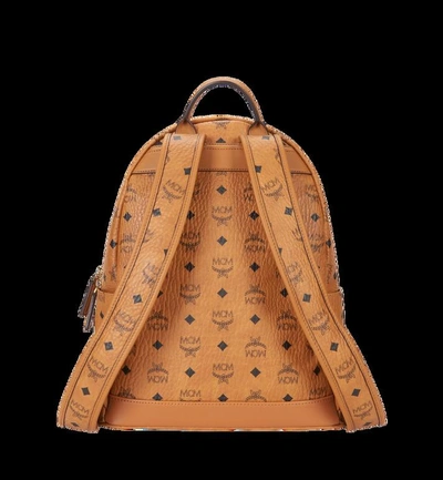 Shop Mcm Trilogie Stark Backpack In Visetos In Cognac