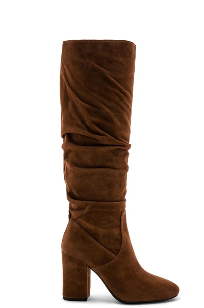 Shop Coach Graham Slouchy Heel Boot In Saddle