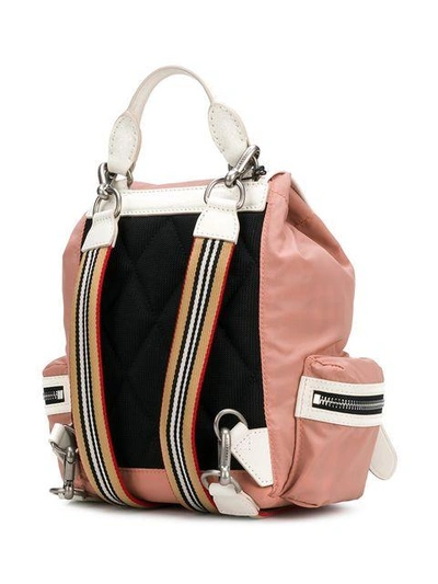 Shop Burberry The Small Crossbody Backpack - Pink & Purple
