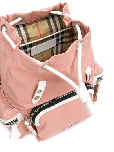 Shop Burberry The Small Crossbody Backpack - Pink & Purple