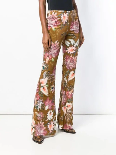 Shop Black Coral Flared Floral Trousers In Neutrals