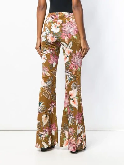 Shop Black Coral Flared Floral Trousers In Neutrals