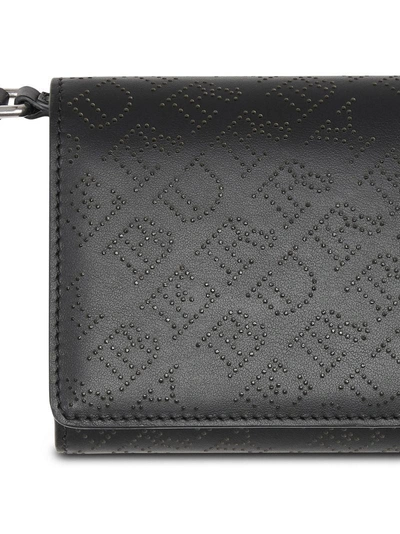 Shop Burberry Perforated Logo Clutch Bag In Black