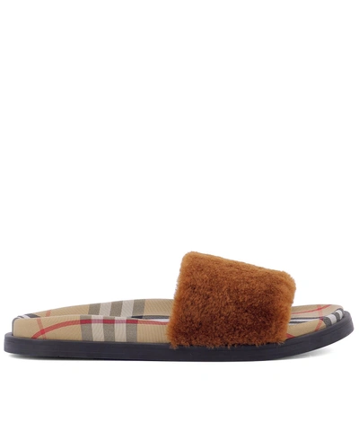 Shop Burberry Shearling Slides In Brown