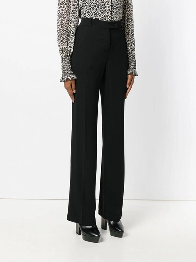 Shop Pinko Tab Front Flared Trousers In Black