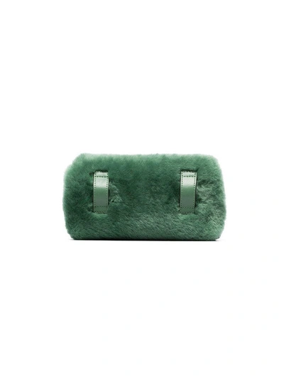 Shop Fendi Green Logo Belt Shearling Bag