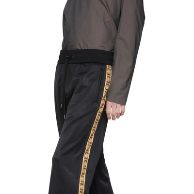 Shop Versace Black Side Print Lounge Trousers In A008 Black