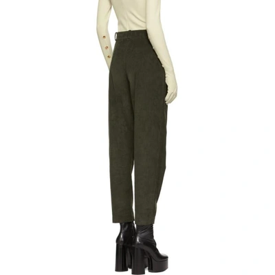 Shop A.w.a.k.e. Mode Green Tapered Double Pleat Trousers In Hungergreen