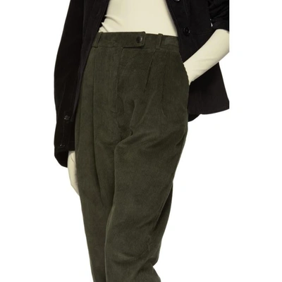 Shop A.w.a.k.e. Mode Green Tapered Double Pleat Trousers In Hungergreen