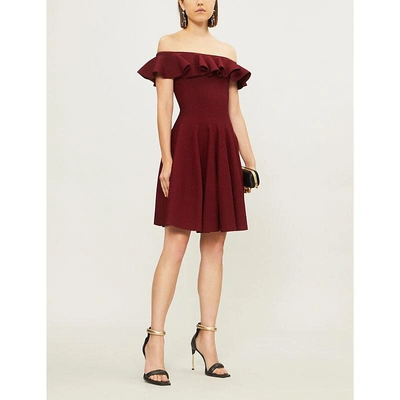 Shop Alexander Mcqueen Off-the-shoulder Knitted Mini Dress In Carmine