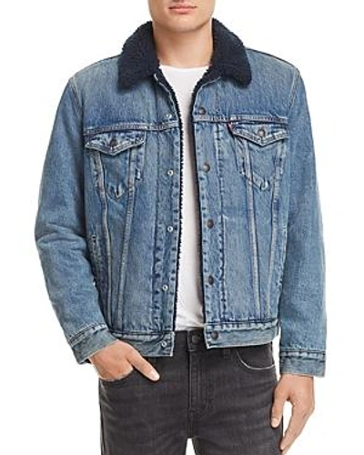 Shop Levi's Faux Shearling-lined Denim Trucker Jacket In Indigo Lamb