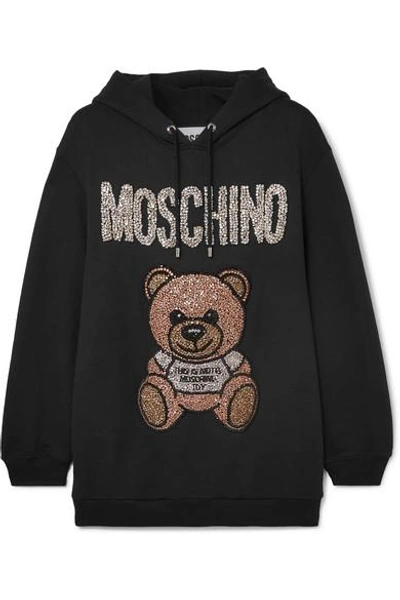 Shop Moschino Oversized Crystal-embellished Cotton-jersey Hoodie In Black