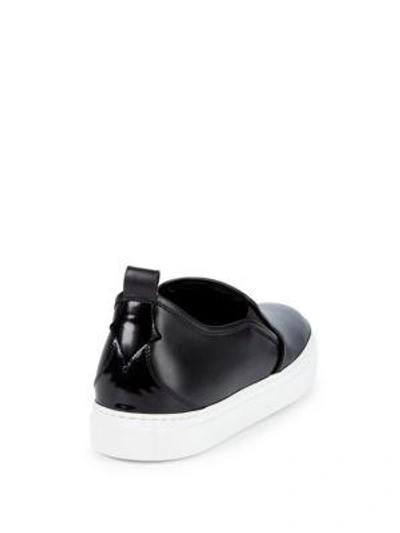 Shop Roberto Cavalli Monogram Logo Slip-ons In Black