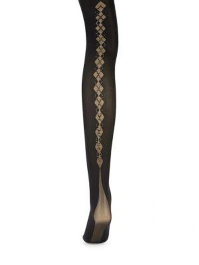 Shop Wolford Argyle Tights In Black