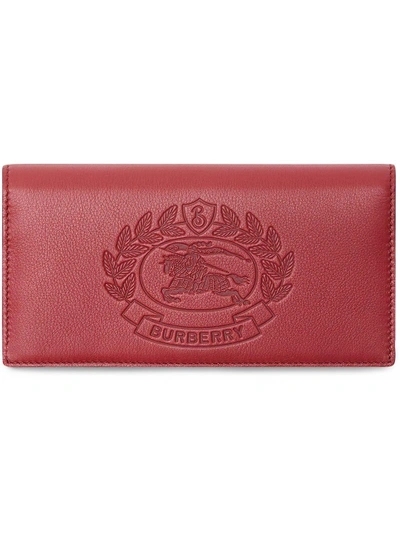Shop Burberry Embossed Crest Leather Continental Wallet - Pink