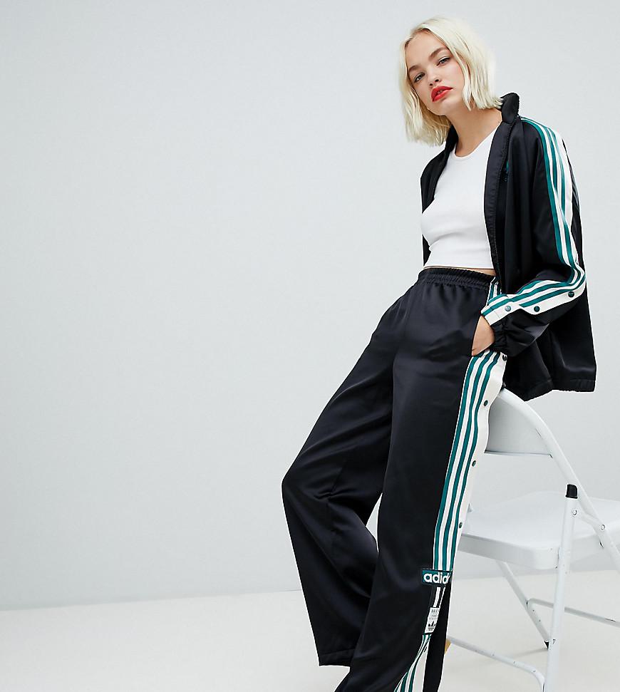 adidas originals mixed stripe popper pants in black and white