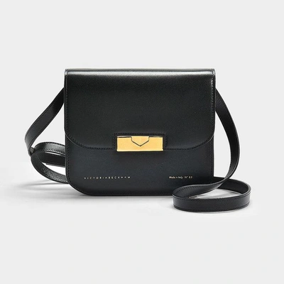 Shop Victoria Beckham | Eva Crossbody In Black Calfskin