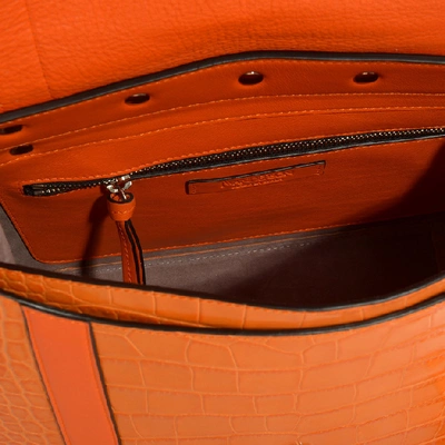 Shop Jw Anderson J.w. Anderson | Disc Satchel In Orange Crocodile Embossed Calfskin