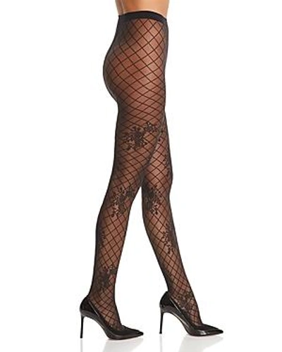 Shop Wolford Helena Floral Fishnet Tights In Black