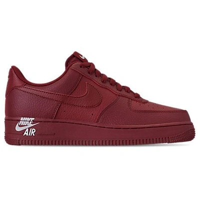 Shop Nike Men's Air Force 1 '07 Leather Casual Shoes, Red