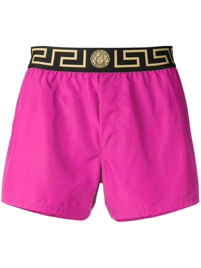 Shop Versace Logo Band Swim Shorts In Pink
